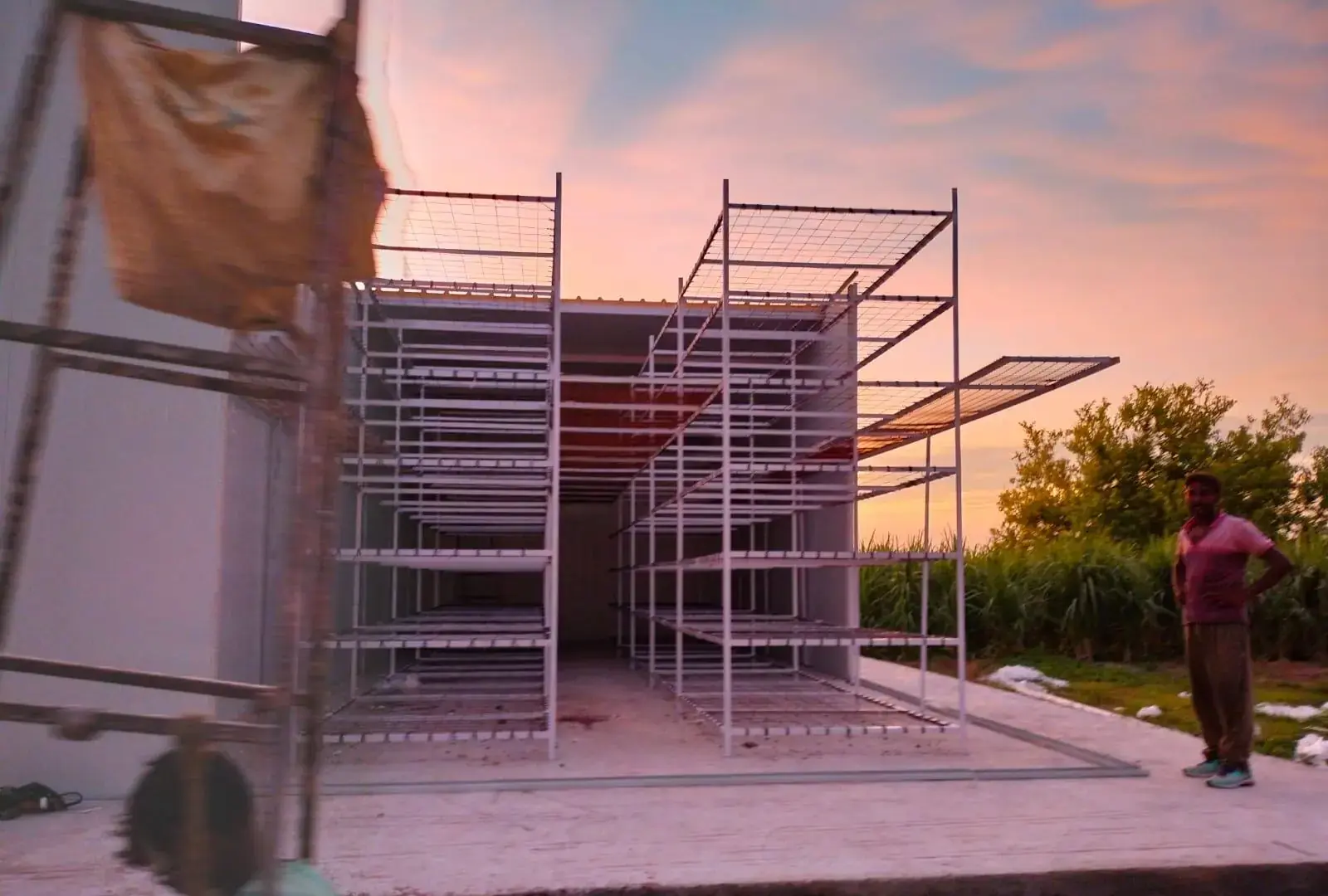 Rack structure going up at dusk